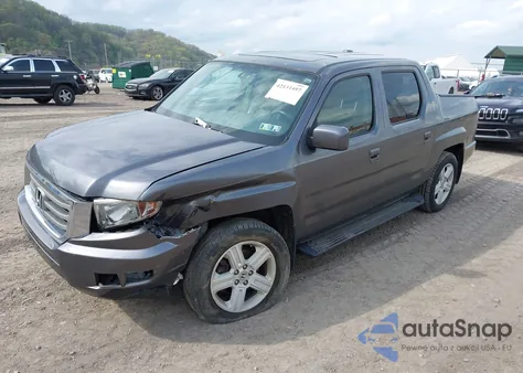 2014 Honda Ridgeline Rtl z USA, uszkodzony, nr VIN 5FPYK1F50EB003633